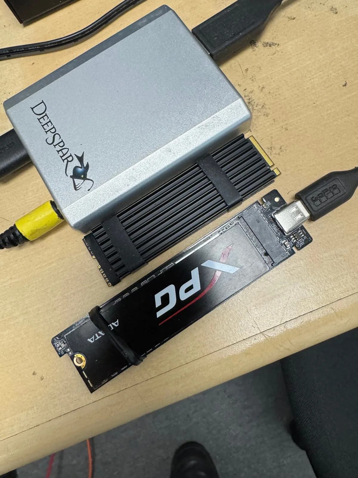 NVMe SSD connected to professional DeepSpar equipment for controlled imaging and assessment